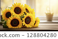Sunflowers on a wooden table by a window. Natural home decor aesthetic. 128804280