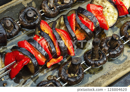 Colorful vegetable skewers. 128804620