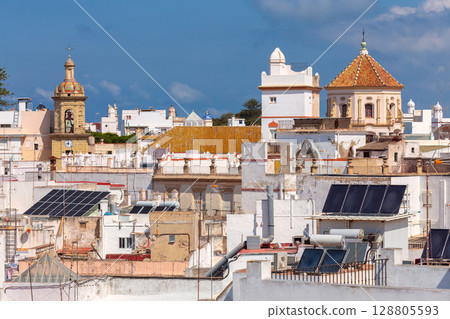 Rooftops and historic towers in Cadiz, Spain on a sunny day 128805593