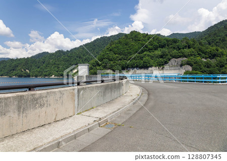 Yagisawa Dam - Passing over the arch embankment Yagisawa Dam - Passing over the arch embankment 128807345