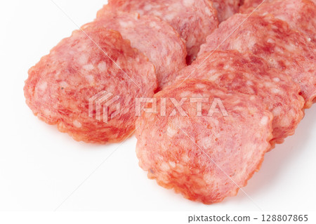 Sliced salami close-up Sliced salami close-up 128807865