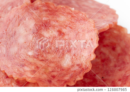 Sliced salami close-up Sliced salami close-up 128807985