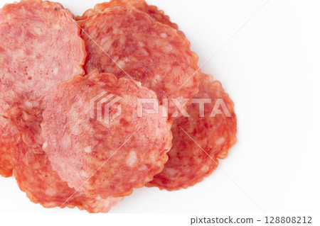 Sliced salami close-up 128808212