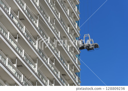 Tower apartment gondola maintenance 128809236