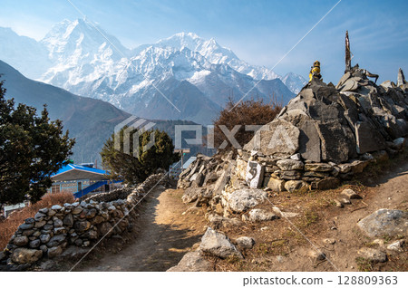 Beautiful view of Pangboche village in Nepal with Mt.Kangtega (6,779 m) and Mt.Thamserku (6,608 m) in the background. Beautiful view of Pangboche village in Nepal with Mt.Kangtega (6,779 m) and Mt.Thamserku (6,608 m) in the background. 128809363