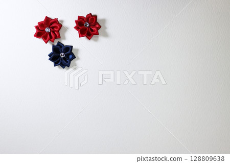 A floral accent on a white background 128809638