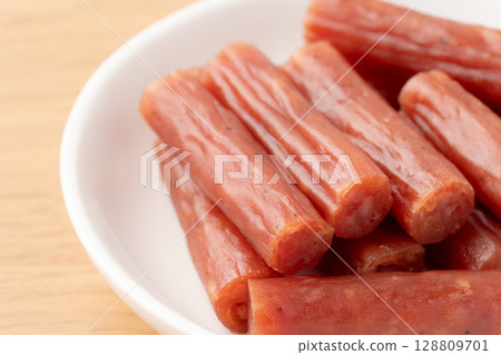 Close-up of dried sausage (karpas) on a plate 128809701