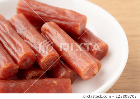 Close-up of dried sausage (karpas) on a plate 128809702