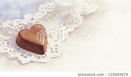 Heart shaped chocolate on lace, a symbol of pure love. A sweet gift of love 128809879