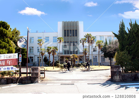 The exterior of the building from the gate of Shiga Prefectural Yahata Commercial High School 128810808