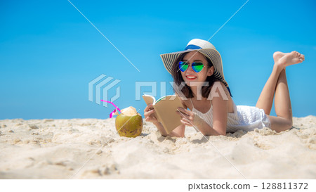 Lifestyle young  woman relax on the summer beach.  Asia tourism 128811372