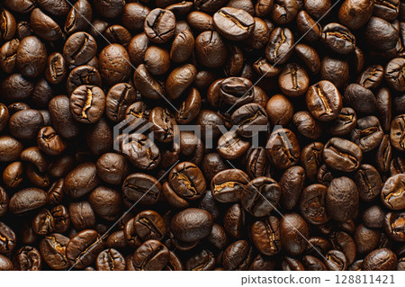 Roasted coffee beans texture background 128811421
