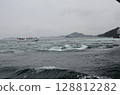 Naruto whirlpools seen from a sightseeing boat 128812282