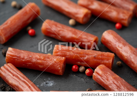 Close-up of dry sausage (karpas) with various spices 128812596