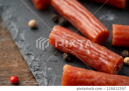 Close-up of dry sausage (karpas) with various spices 128812597
