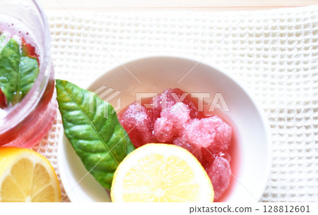 Drinkable ice - A drink that cools you from the inside out during the heatwaves of summer. Drink ice to keep you cool with juice Drinkable ice - A drink that cools you from the inside out during the heatwaves of summer. Drink ice to keep you cool with juice 128812601