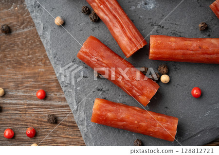 Close-up of dry sausage (karpas) with various spices Close-up of dry sausage (karpas) with various spices 128812721