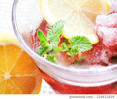 Drinkable ice - A drink that cools you from the inside out during the heatwaves of summer. Drink ice to keep you cool with juice 128812829
