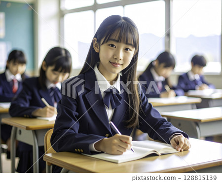 Japanese female students concentrating on studying in the classroom: bright school life 128815139