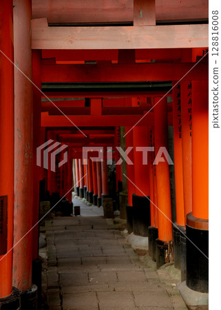 1000 red Torii gates in Kyoto A slope of red torii gates leading to the grounds of an old Japanese shrine 1000 red Torii gates in Kyoto A slope of red torii gates leading to the grounds of an old Japanese shrine 128816008