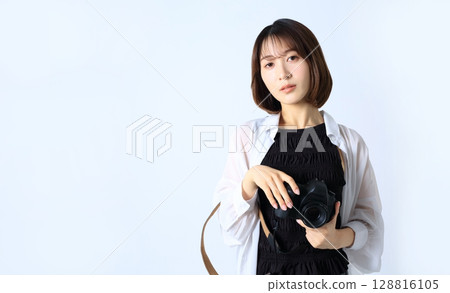 SLR camera and woman image SLR camera and woman image 128816105