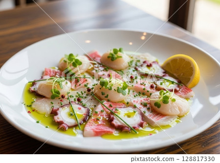 Seafood carpaccio with octopus and scallops an elegant appetizer in a fine dining restaurant 128817330