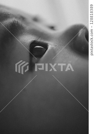 Cutting the baby's eye area 128818389