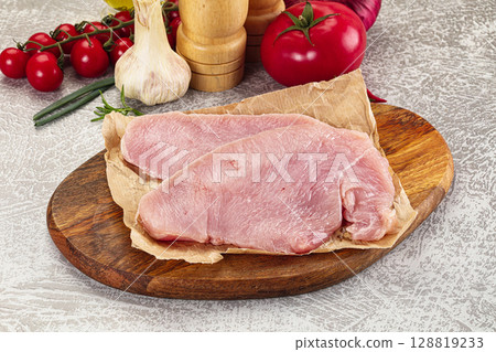 Raw uncooked turkey fillet steak Raw uncooked turkey fillet steak 128819233