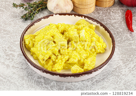 Italian cuisine - yellow risotto with chicken 128819234