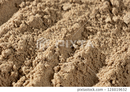 Ground Flax Flour Close-Up. Natural Brown Superfood Background. 128819632