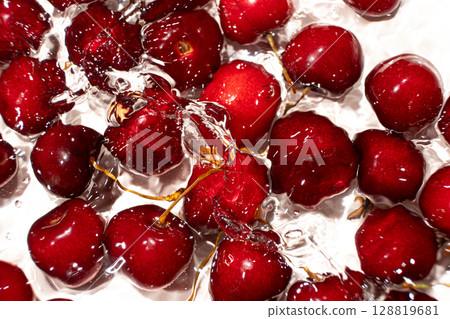 Top View of Sweet Cherry Splashing in Water. 128819681