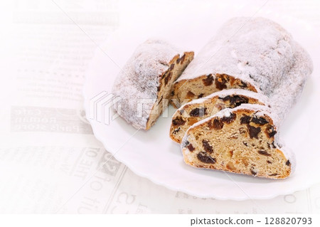 Stollen, German sweet bread, cut, cross section Stollen, German sweet bread, cut, cross section 128820793