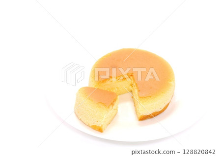 Cheesecake cut cross section light background Cheesecake cut cross section light background 128820842