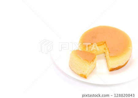 Cheesecake cut cross section light background 128820843