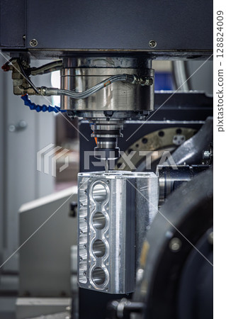 Metalworking CNC lathe milling machine. Cutting metal modern processing technology. 128824009