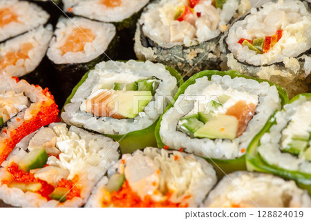 Tasty food. Sushi Roll background... 128824019