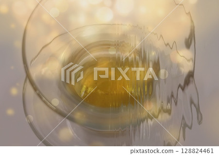 Abstract Turkish Tea Reflection with Golden Bokeh Abstract Turkish Tea Reflection with Golden Bokeh 128824461
