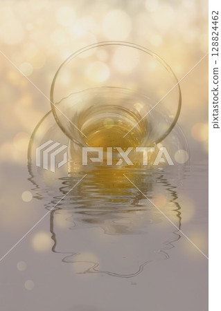 Abstract Turkish Tea Reflection with Golden Bokeh 128824462
