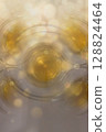 Abstract Turkish Tea Reflection with Golden Bokeh 128824464