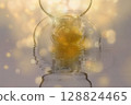 Abstract Turkish Tea Reflection with Golden Bokeh 128824465