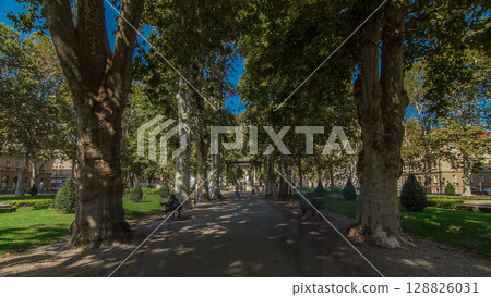 People around pavillion in Zrinjevac park timelapse hyperlapse in Zagreb, Croatia. 128826031