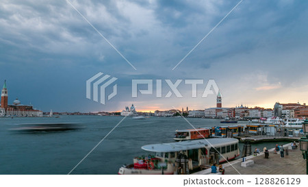 Basilica Santa Maria della Salute, Cathedral of San Giorgio Maggiore at sunset timelapse, Venezia, Venice, Italy 128826129