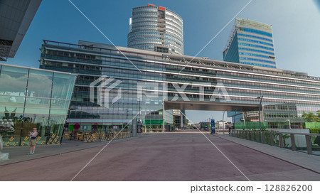 Donaustadt Danube City timelapse hyperlapse is a modern quarter with skyscrapers and business centres in Vienna, Austria. Donaustadt Danube City timelapse hyperlapse is a modern quarter with skyscrapers and business centres in Vienna, Austria. 128826200