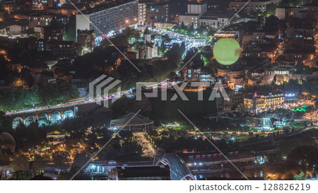 Aerial night timelapse of Rike Park, a modern urban park in Tbilisi's Old Town. Georgia Aerial night timelapse of Rike Park, a modern urban park in Tbilisi's Old Town. Georgia 128826219
