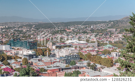 Aerial view of column of freedom in the center of the city timelapse in Tbilisi. Georgia 128826231