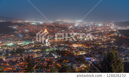 Tbilisi cityscape at twilight, Georgia day to night transition timelapse. 128826232