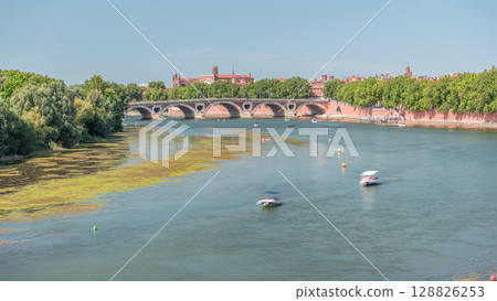 Garonne River and Pont Neuf timelapse in downtown Toulouse, France Garonne River and Pont Neuf timelapse in downtown Toulouse, France 128826253