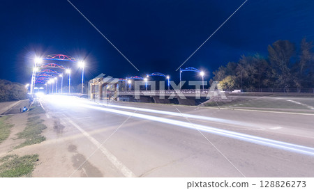 Traffic on a bridge in Uralsk night timelapse hyperlapse. Traffic on a bridge in Uralsk night timelapse hyperlapse. 128826273