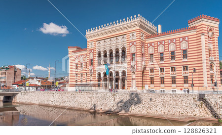 View at city hall in old town center of Sarajevo timelapse hyperlapse, landmark in capital of Bosnia and Herzegovina, Europe View at city hall in old town center of Sarajevo timelapse hyperlapse, landmark in capital of Bosnia and Herzegovina, Europe 128826321