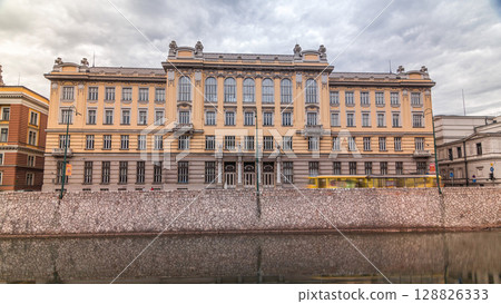 Miljacka river and post office in Sarajevo the capital city of Bosnia and Herzegovina timelapse hyperlapse 128826333